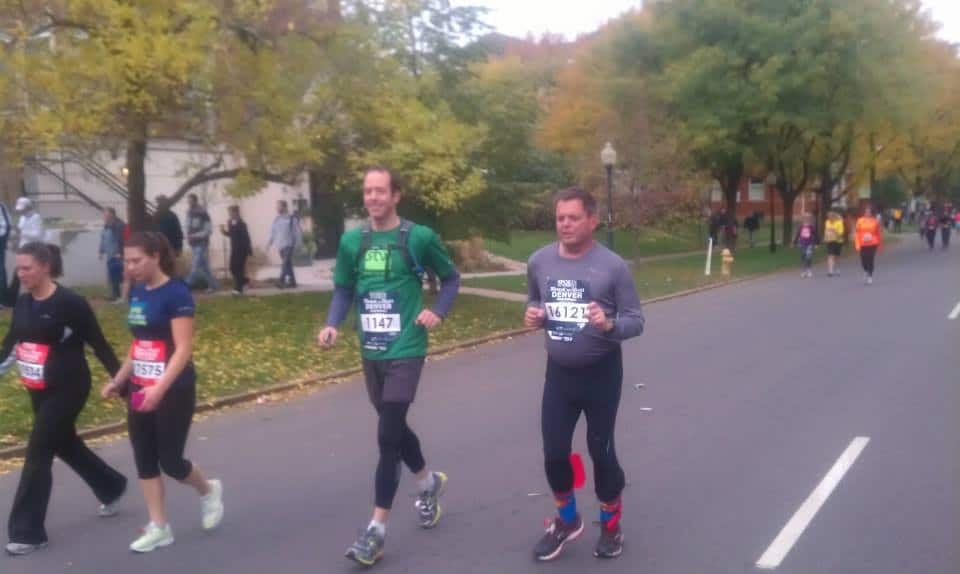 Brad Rinehart running with Charles Koller on 17th st. in the Rock 'n' Roll Marathon.  Charles helped Brad with training and preparation for the marathon.