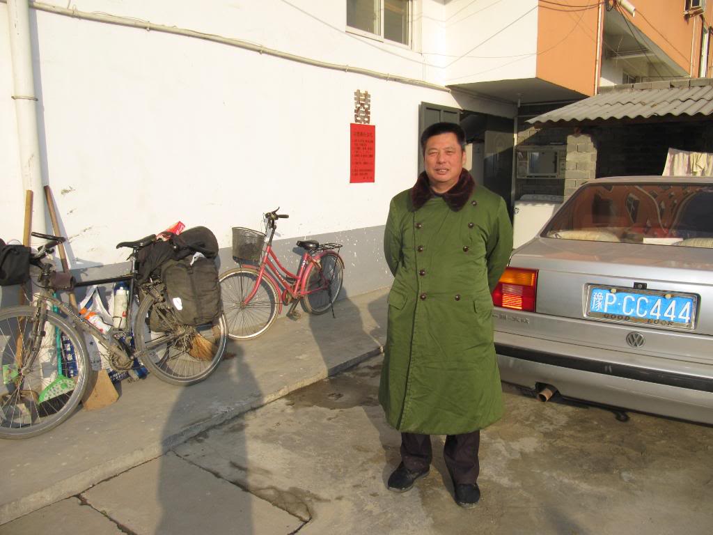 You see a lot of guys - and girls - wearing jackets like this in China. This man was the innkeeper at a hotel where George and I stayed.