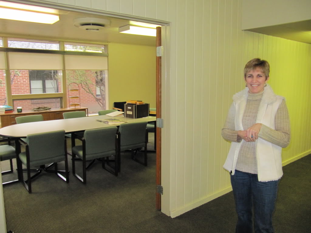 Debbie Snow, showing off the newly-remodeled conference room at the Epilepsy Foundation Offices in Boise, Idaho.  Debbie has epilepsy.