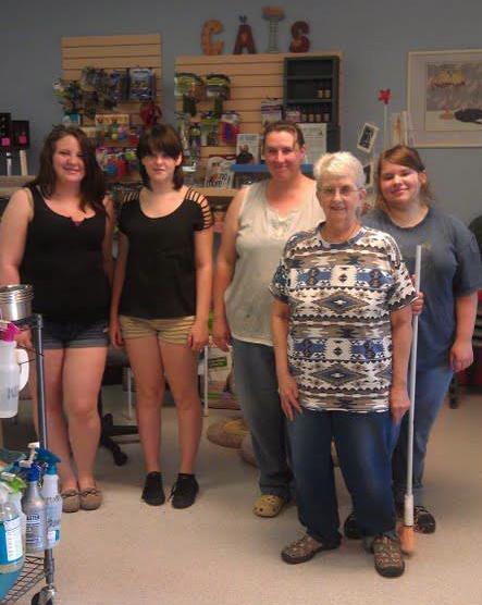 Delaney with her coworkers at Happy Cats Haven Cat Shelter in Colorado Springs